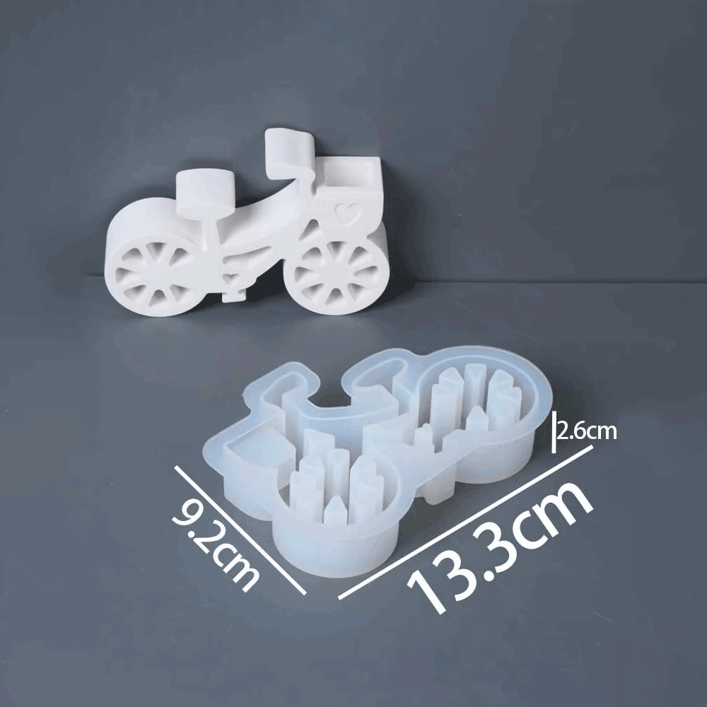 A white tractor-shaped cookie cutter and matching translucent plastic mold shown on a dark gray background, with overlaid dimension lines and text reading 9.2 cm, 13.
