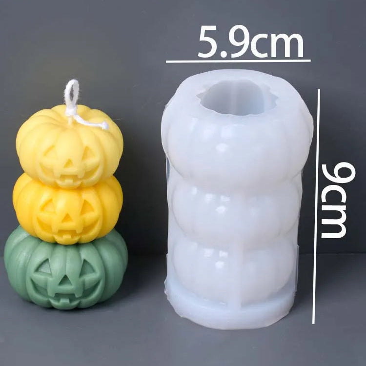 A Halloween-themed product photo showing a white silicone mold alongside three finished jack-o'-lantern candles in yellow and green. White text overlays indicate the mold's dimensions (5.